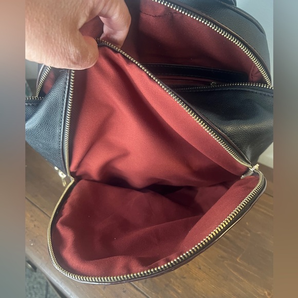 A Fashion inspired  Medium Studded Pebbled Vegan Leather Backpack - Picture 3 of 8